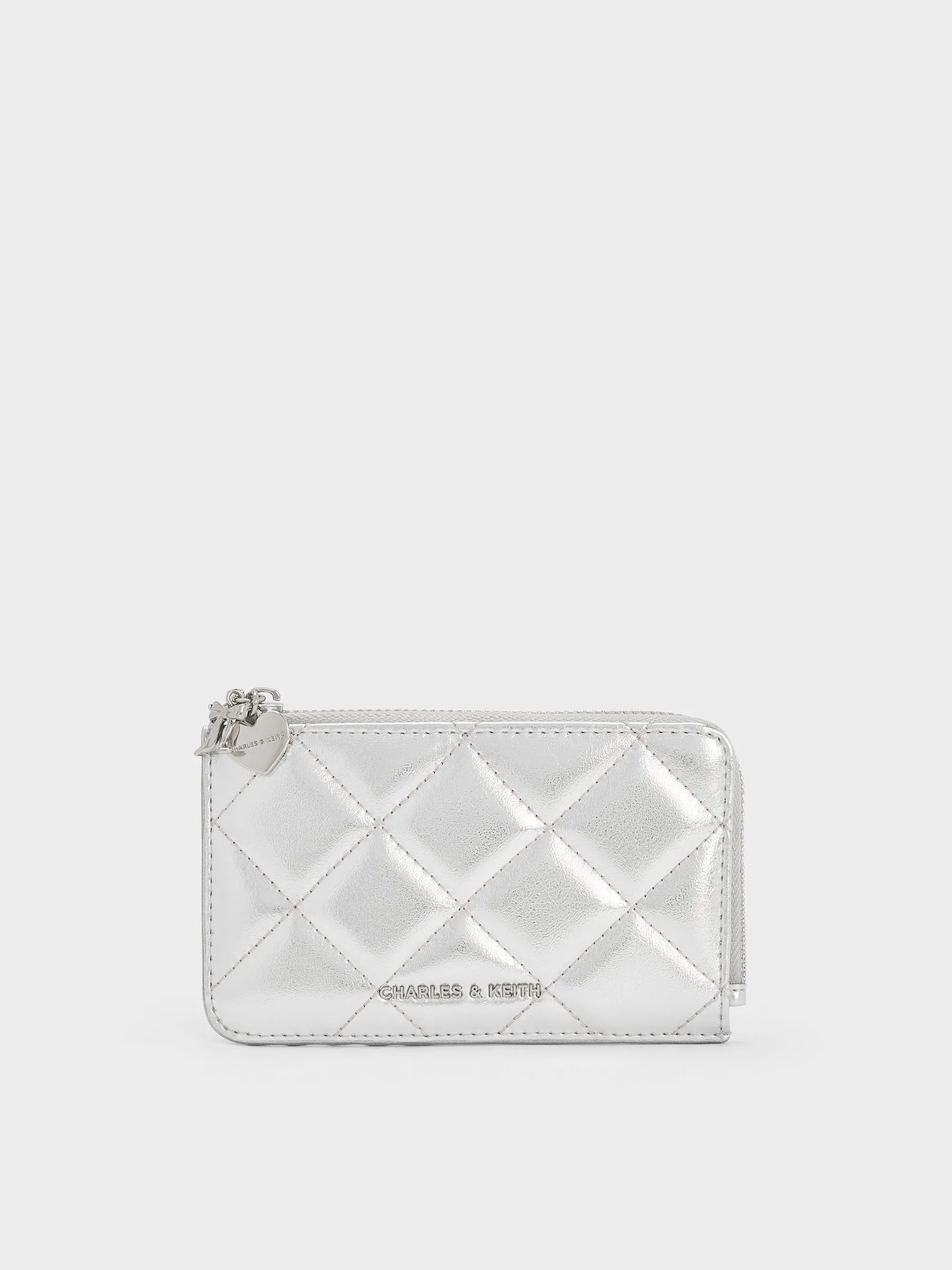 Charles & Keith - Arrietty Metallic Quilted Bow-Heart Charm Zip-Around Wallet sold by Charles & Keith