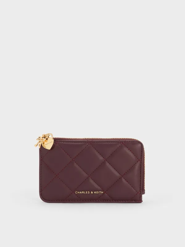 Charles & Keith - Arrietty Quilted Bow-Heart Charm Zip-Around Wallet sold by Charles & Keith