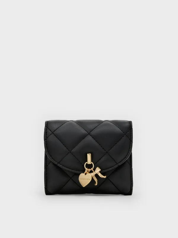 Charles & Keith - Arrietty Quilted Bow-Heart Charm Curved-Flap Wallet sold by Charles & Keith