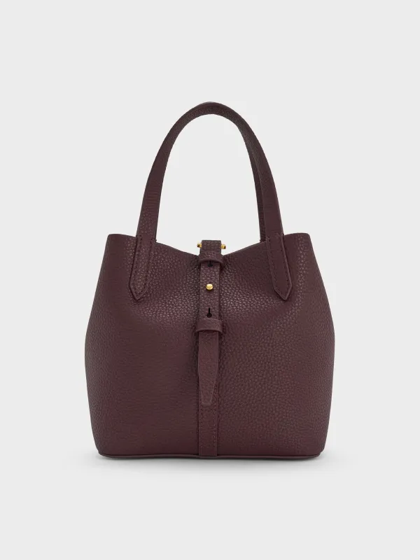 Charles & Keith - Beryl Recycled Leather Double-Handle Belted Bucket Bag sold by Charles & Keith