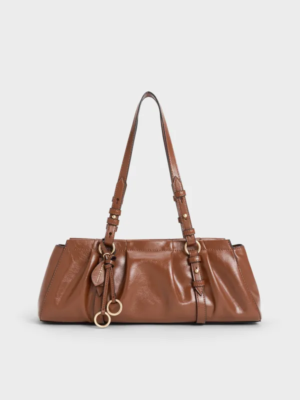 Charles & Keith - Britton Elongated Shoulder Bag sold by Charles & Keith