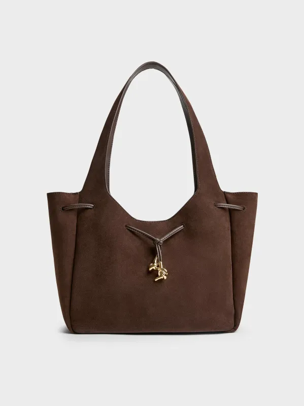 Charles & Keith - Mila Recycled Suede Metallic-Knot Drawstring Tote Bag sold by Charles & Keith