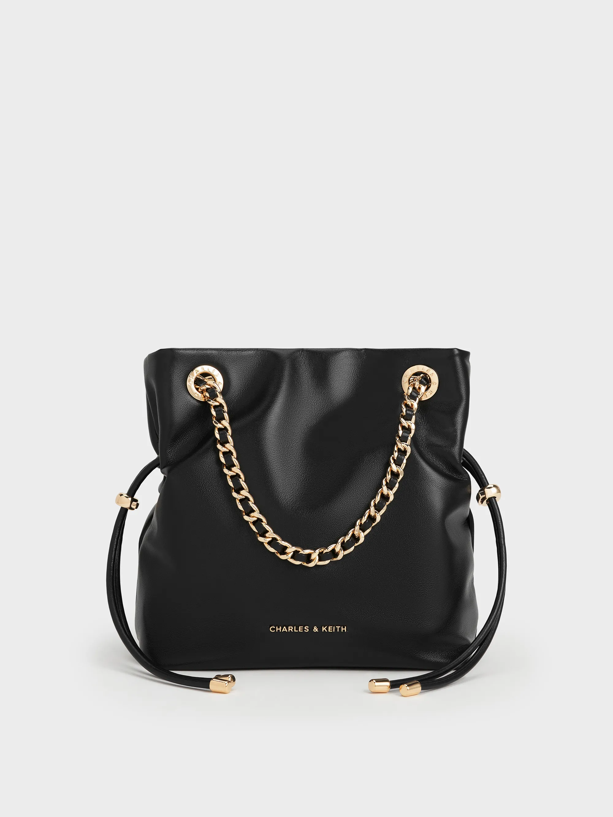 Charles & Keith - Arya Braided-Strap Double-Handle Crossbody Bag sold by Charles & Keith
