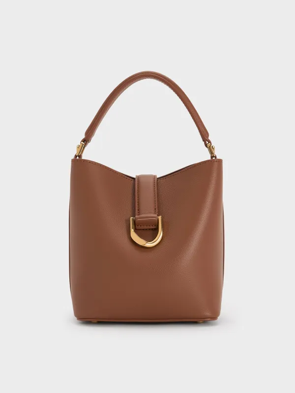 Charles & Keith - Gabine Leather Belted Top-Handle Bucket Bag sold by Charles & Keith