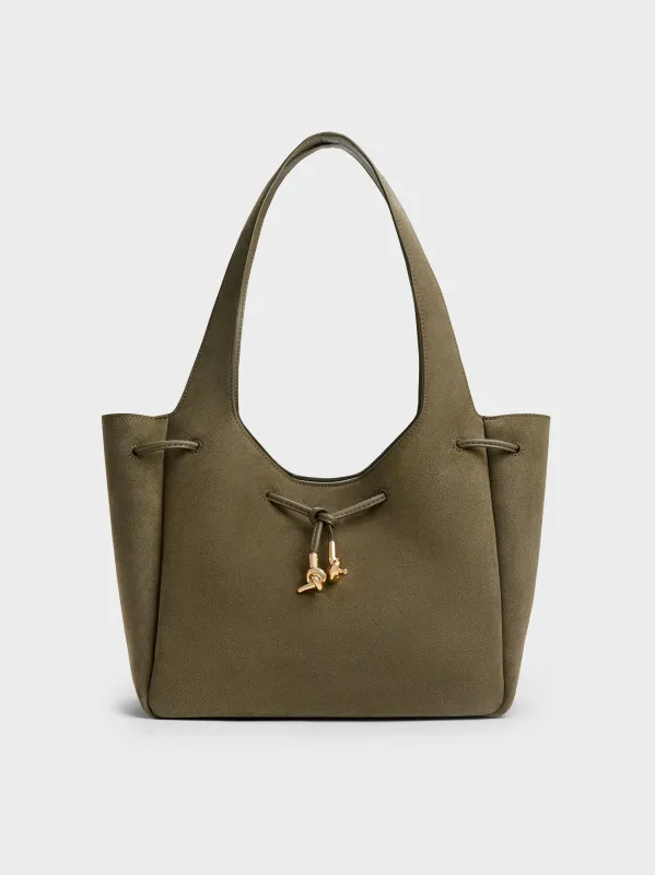 Charles & Keith - Mila Recycled Suede Metallic-Knot Drawstring Tote Bag sold by Charles & Keith