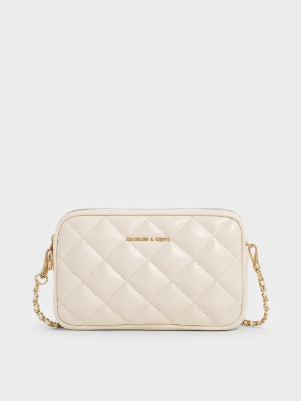 Charles & Keith - Mini Apfra Quilted Crossbody Bag sold by Charles & Keith