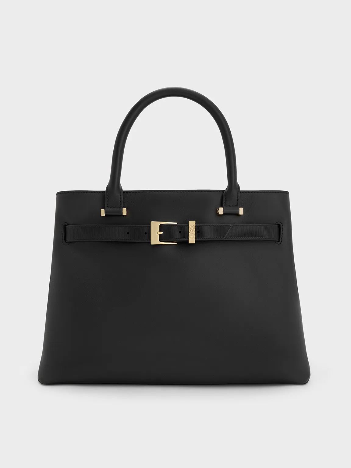 Charles & Keith - Voyager Leather Belted Trapeze Tote Bag sold by Charles & Keith