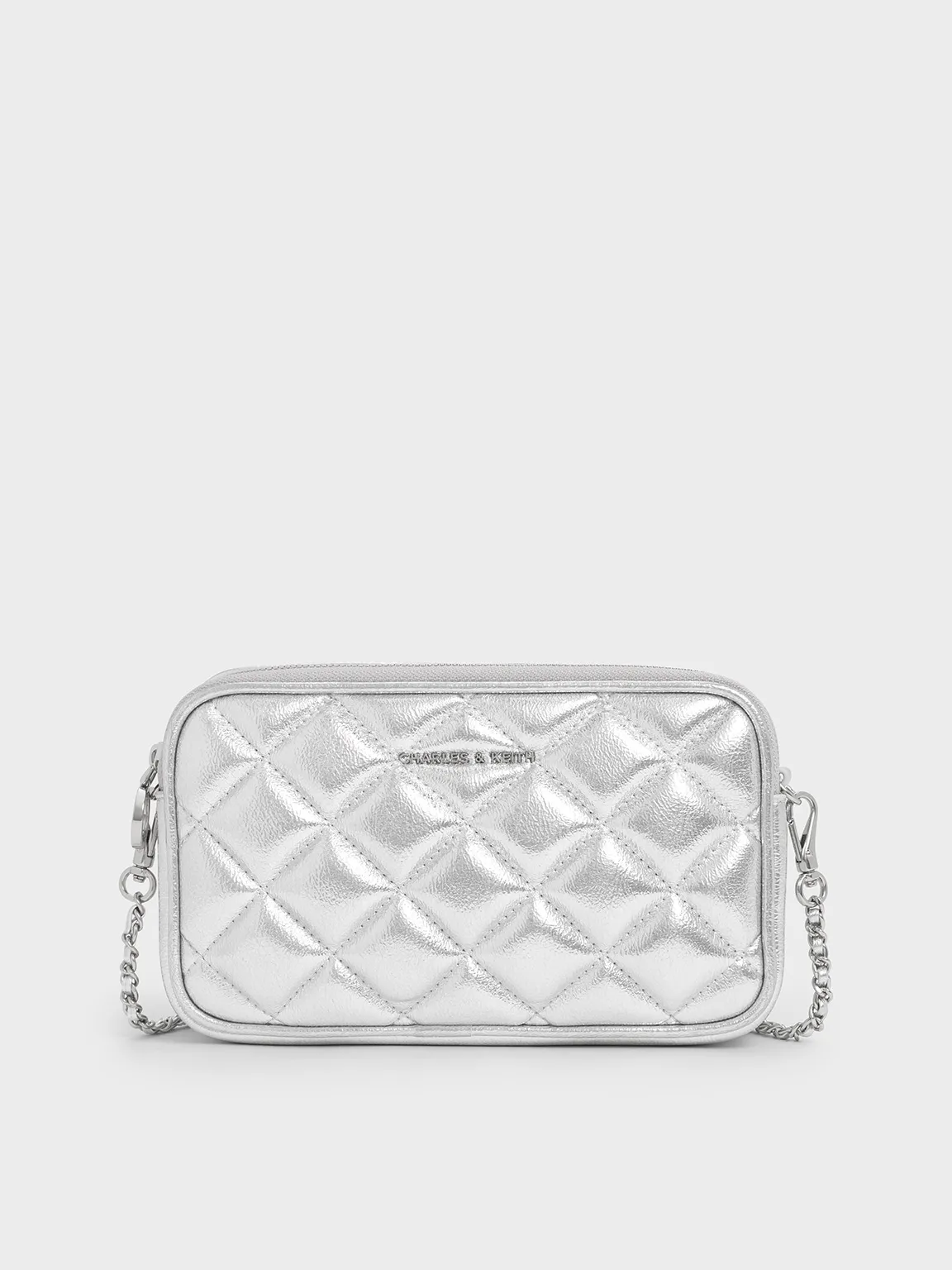 Charles & Keith - Mini Apfra Quilted Crossbody Bag sold by Charles & Keith
