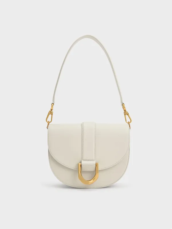 Charles & Keith - Gabine Leather Saddle Bag​ sold by Charles & Keith