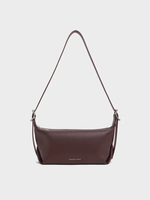 Charles & Keith - Larsen Buckle-Strap Slouchy Shoulder Bag sold by Charles & Keith