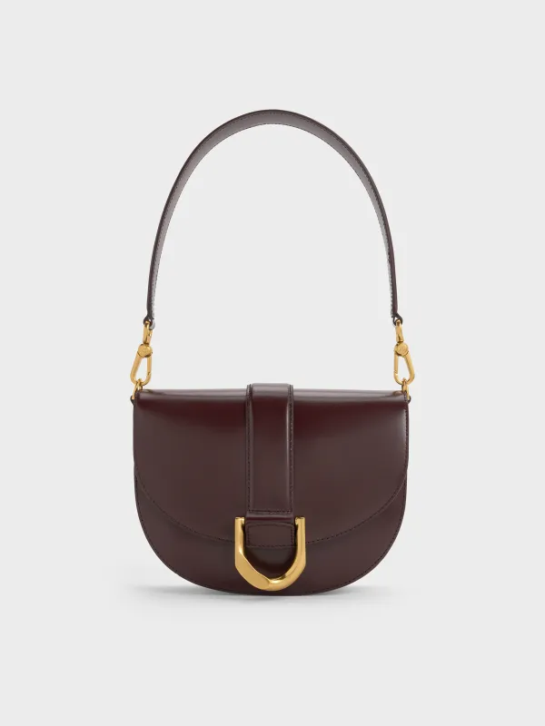 Charles & Keith - Gabine Leather Saddle Bag sold by Charles & Keith
