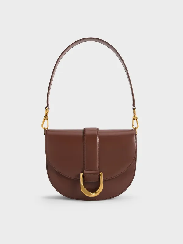 Charles & Keith - Gabine Leather Saddle Bag sold by Charles & Keith
