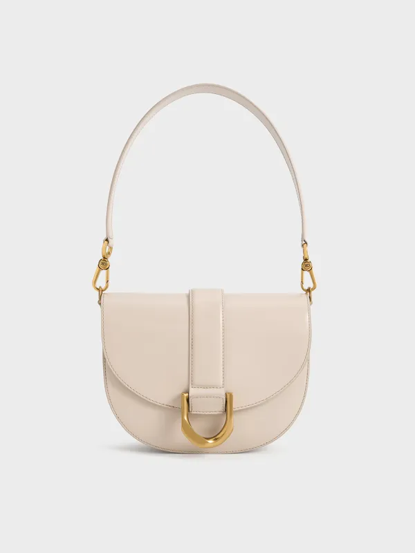 Charles & Keith - Gabine Leather Saddle Bag sold by Charles & Keith