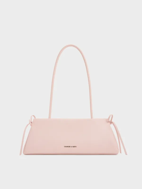 Charles & Keith - Hazel Bow Elongated Trapeze Shoulder Bag sold by Charles & Keith