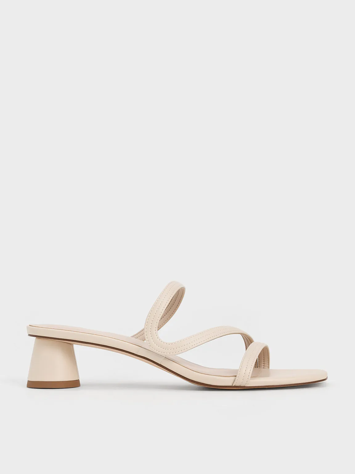 Charles & Keith - Arden Wavy Strap Mules sold by Charles & Keith