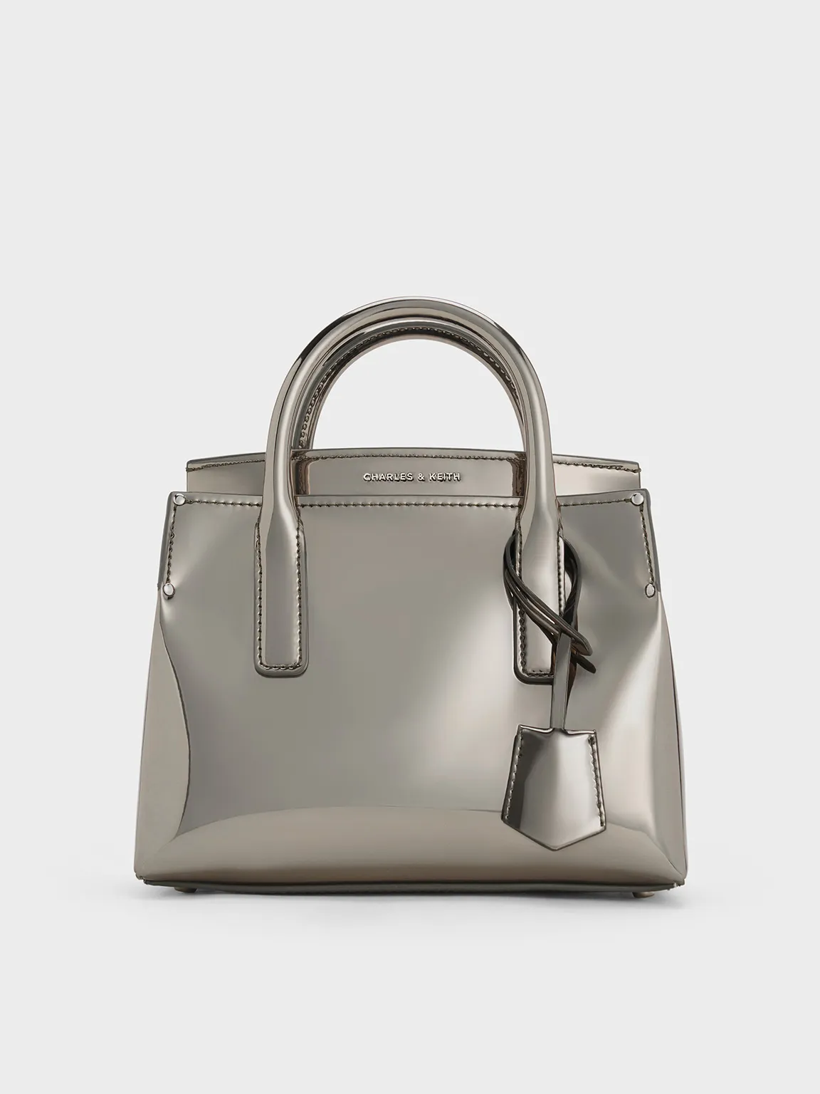 Charles & Keith - Rene Metallic Structured Top Handle Bag sold by Charles & Keith