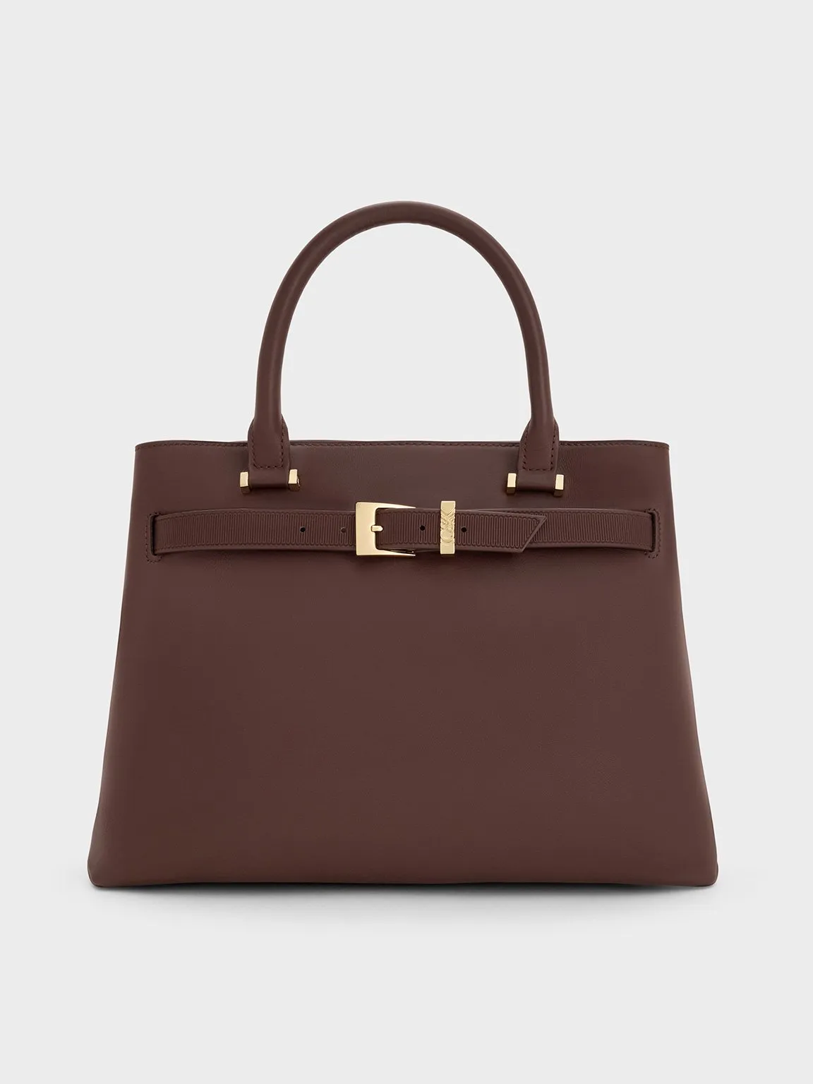 Charles & Keith - Voyager Leather Belted Trapeze Tote Bag sold by Charles & Keith