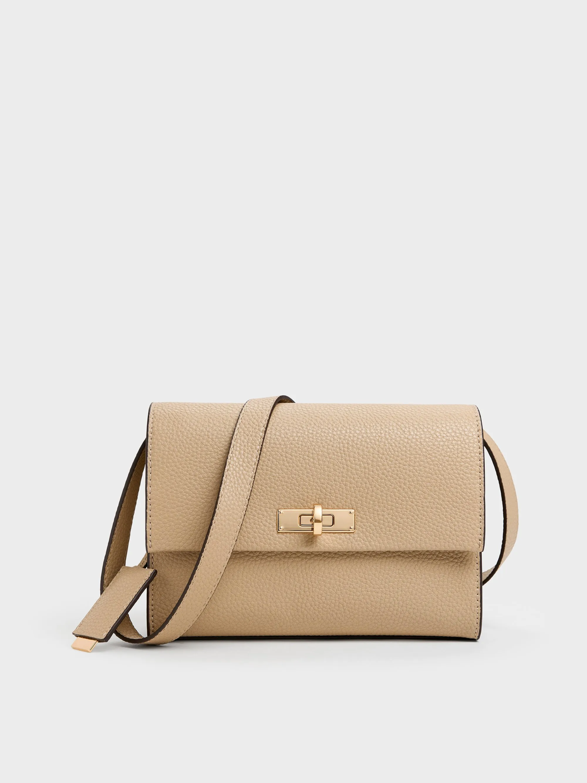 Charles & Keith - Chance Turn-Lock Crossbody Bag sold by Charles & Keith