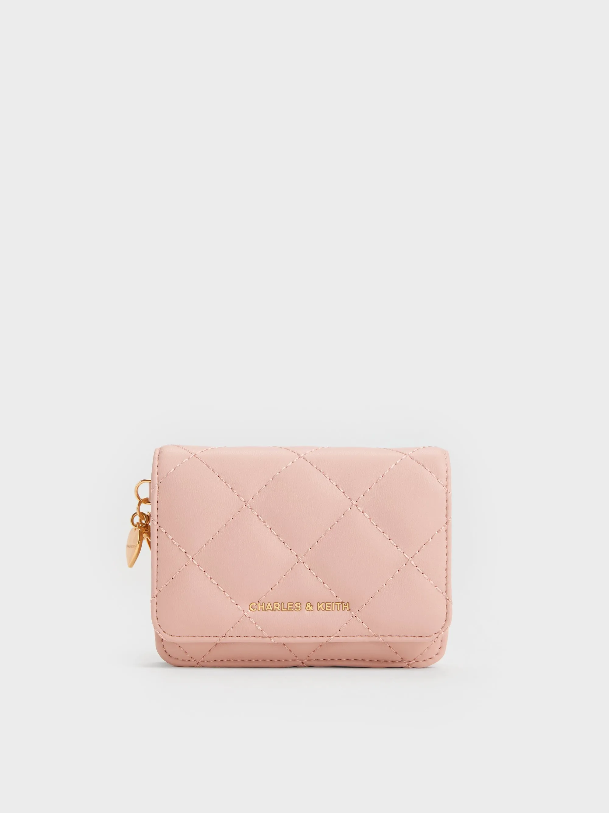 Charles & Keith - Arrietty Quilted Bow-Heart Charm Small Wallet sold by Charles & Keith
