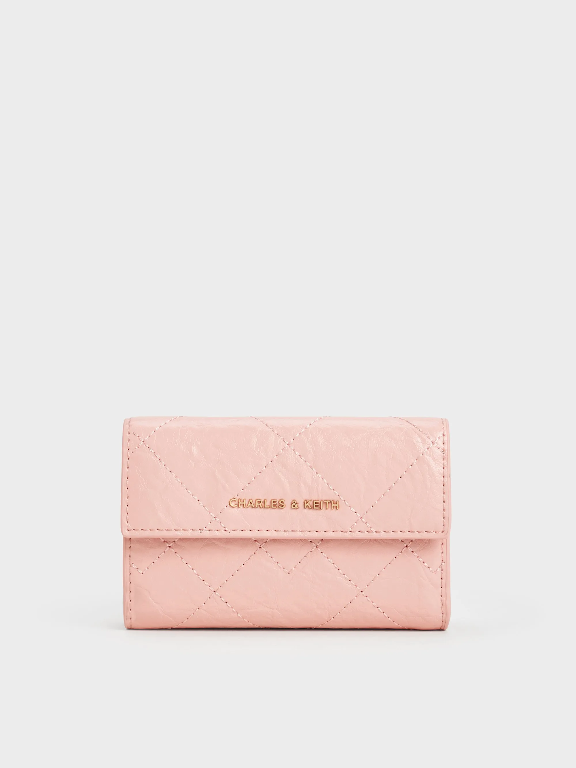 Charles & Keith - Duo Quilted Fold-Over Wallet sold by Charles & Keith