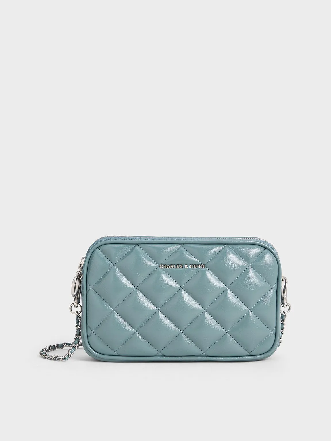 Charles & Keith - Mini Apfra Quilted Crossbody Bag sold by Charles & Keith