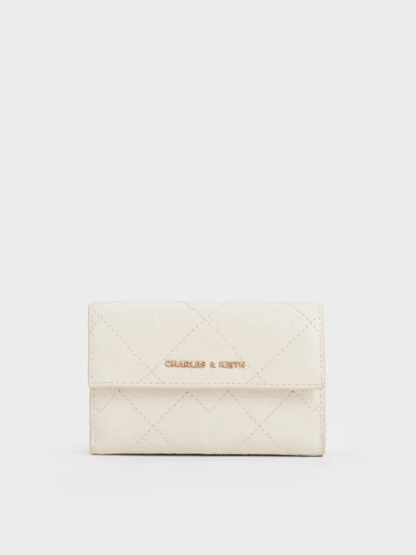 Charles & Keith - Duo Quilted Fold-Over Wallet sold by Charles & Keith