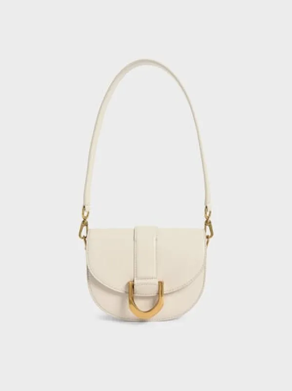 Charles & Keith - Mini Gabine Saddle Bag sold by Charles & Keith