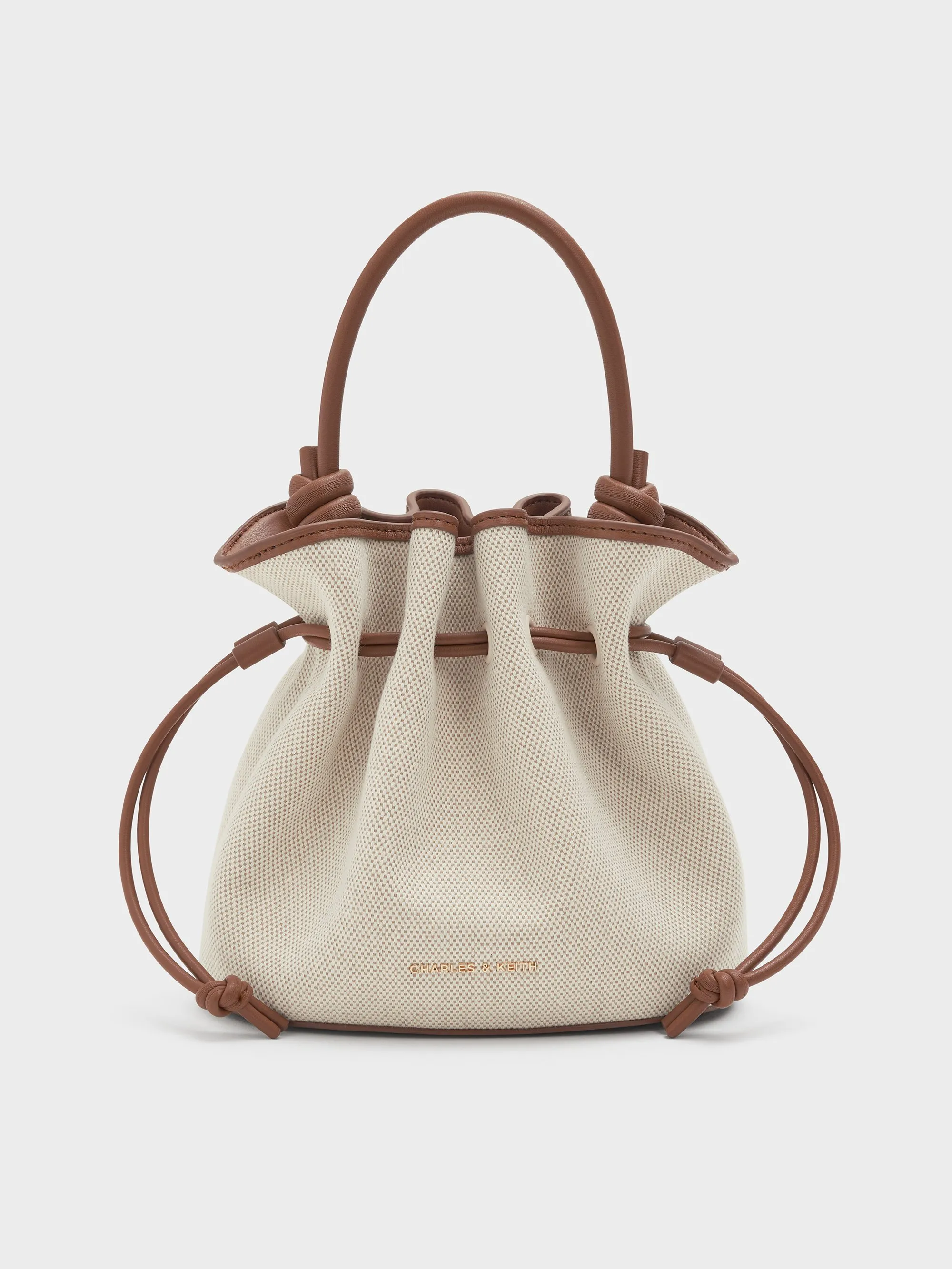 Charles & Keith - Sammie Canvas Drawstring Bucket Bag sold by Charles & Keith