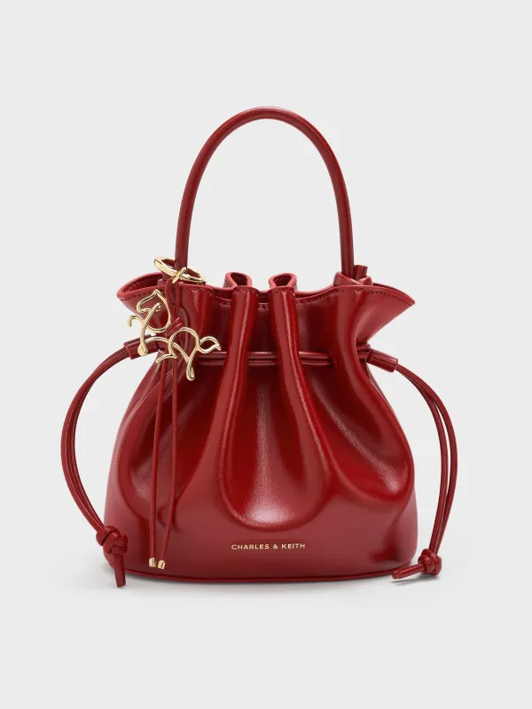 Charles & Keith - Sammie Horse-Motif Drawstring Bucket Bag sold by Charles & Keith