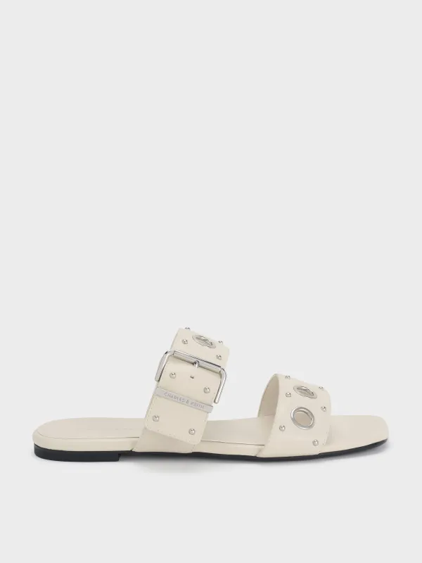 Charles & Keith - Grommet Buckled Slides sold by Charles & Keith