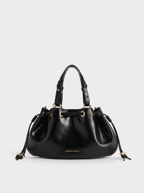 Charles & Keith - Mini Moxie Drawstring Bucket Bag sold by Charles & Keith