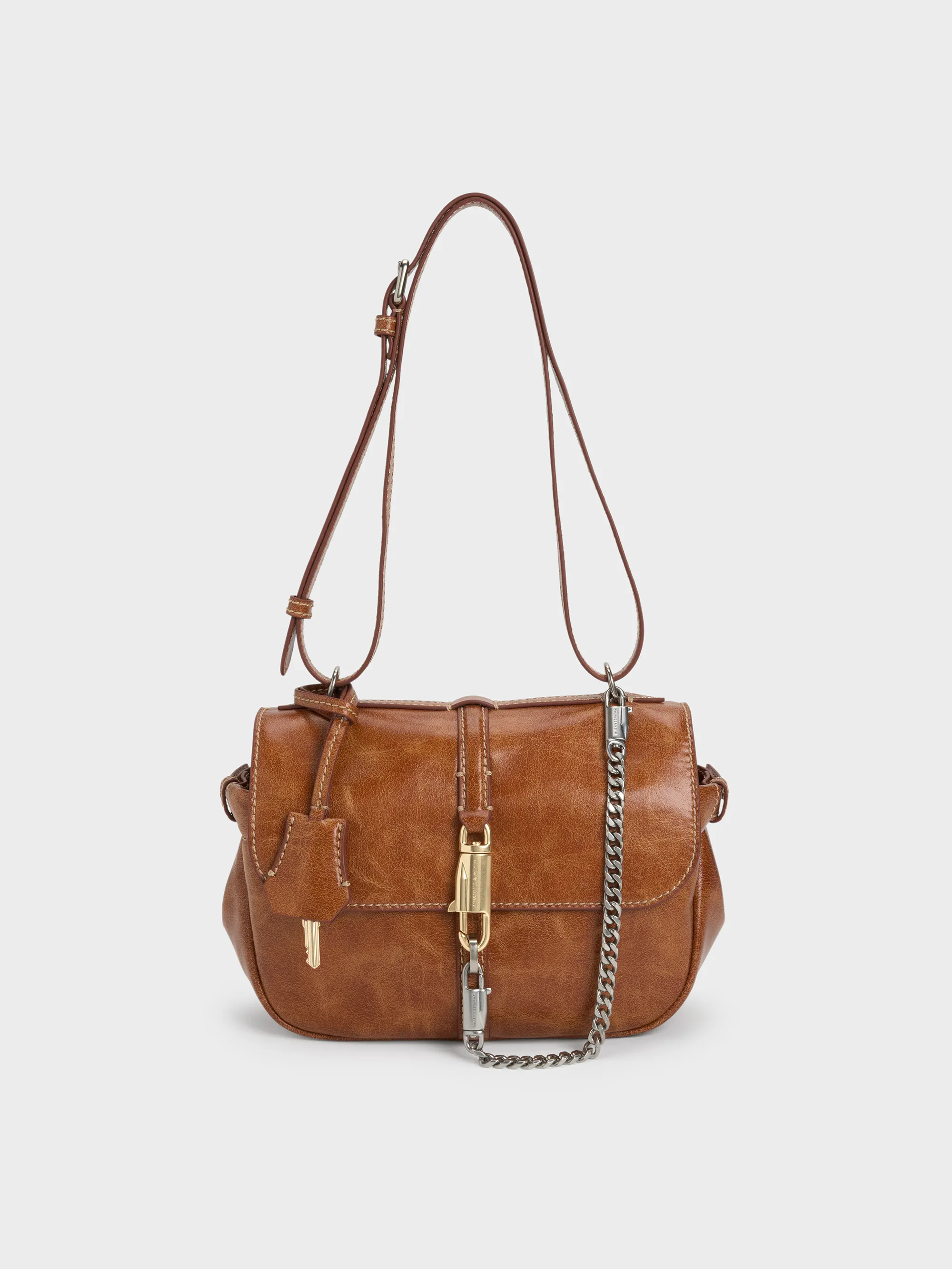 CHARLES & KEITH - Delfina Chain Crossbody Bag sold by Charles & Keith