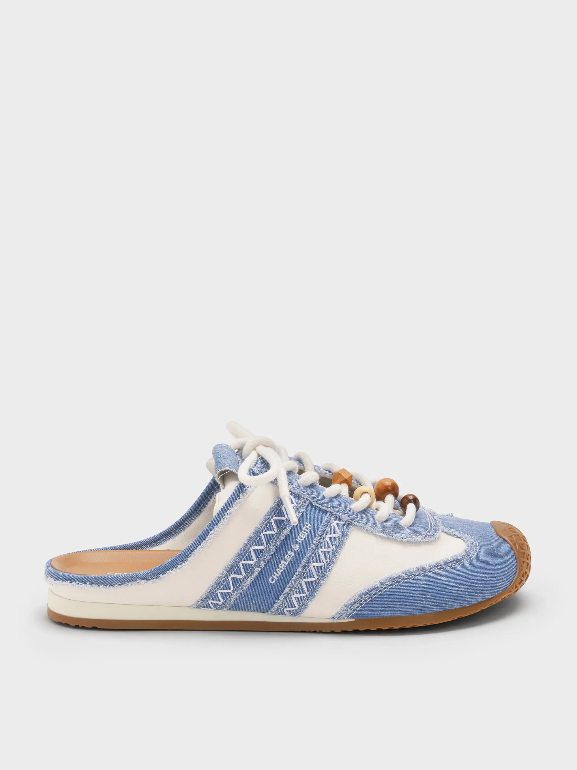 Charles & Keith - Denim & Leather Slip-On Sneakers sold by Charles & Keith