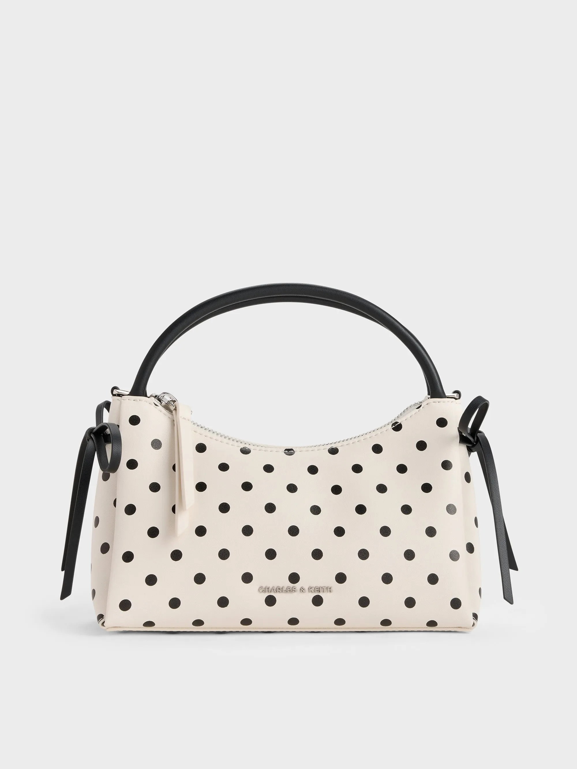 Charles & Keith - Hazel Polka-Dot Bow Top Handle Bag sold by Charles & Keith