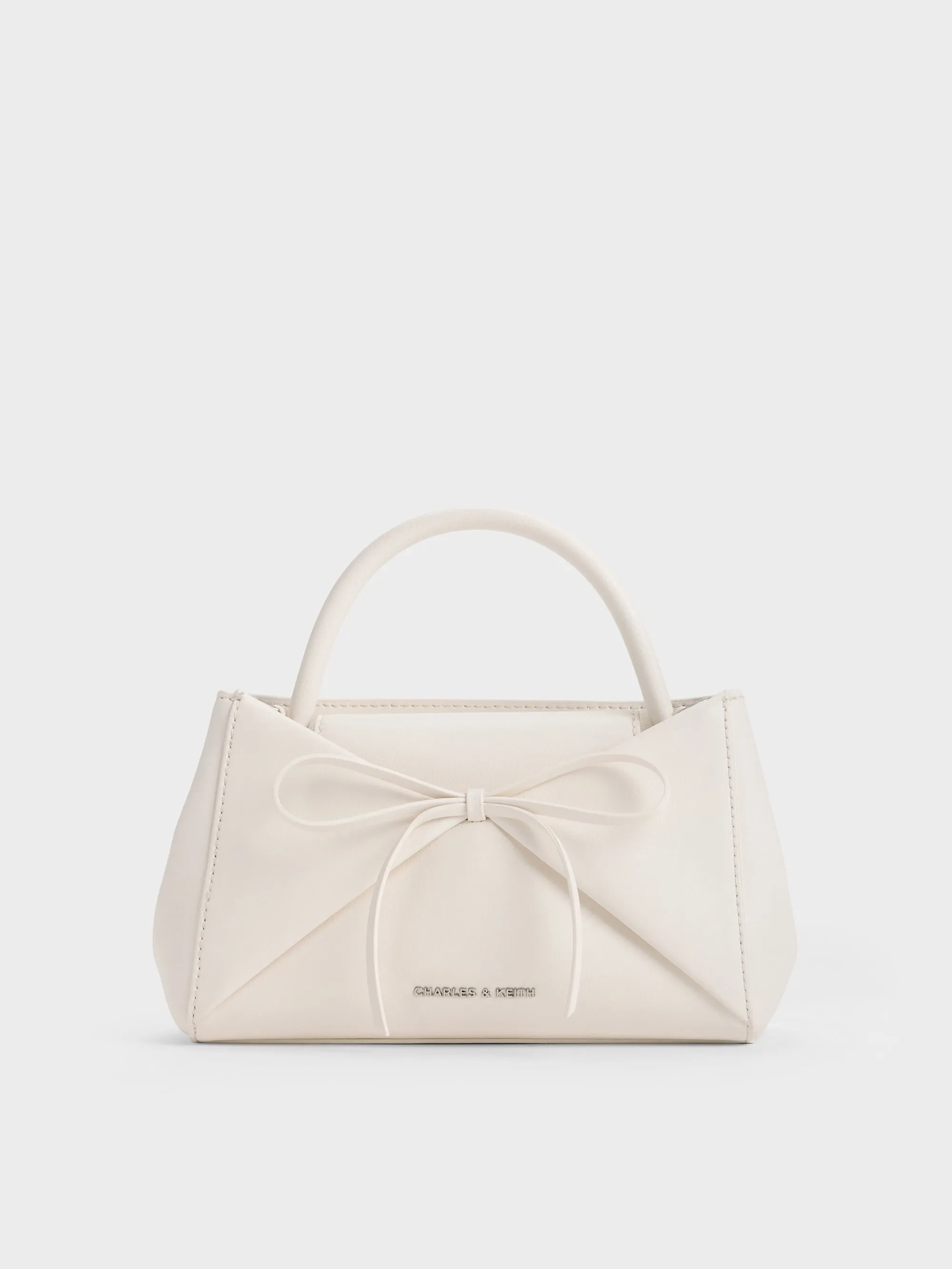 Charles & Keith - Hazel Bow Panelled Top Handle Bag sold by Charles & Keith