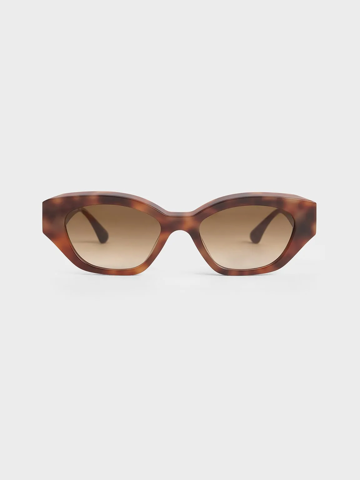 CHARLES & KEITH - Tortoiseshell Recycled Acetate Sculptural Cat-Eye Sunglasses sold by Charles & Keith