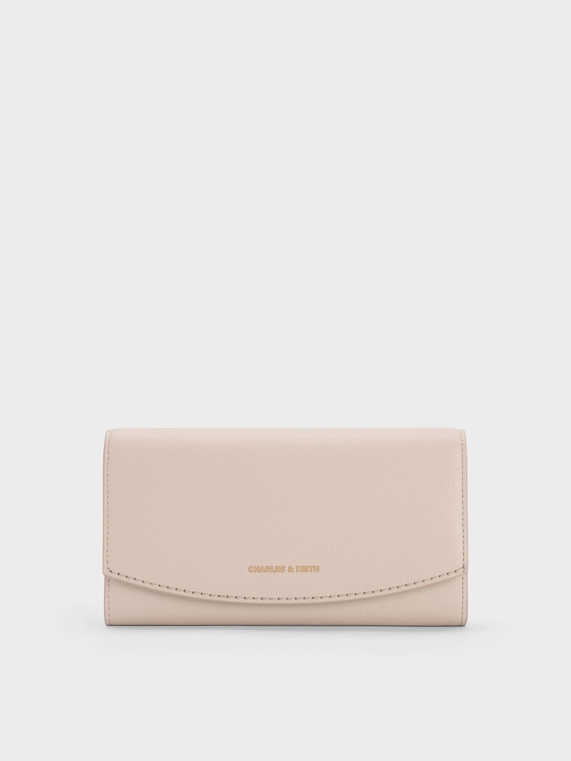 Charles & Keith - Briony Curved Flap Long Wallet sold by Charles & Keith