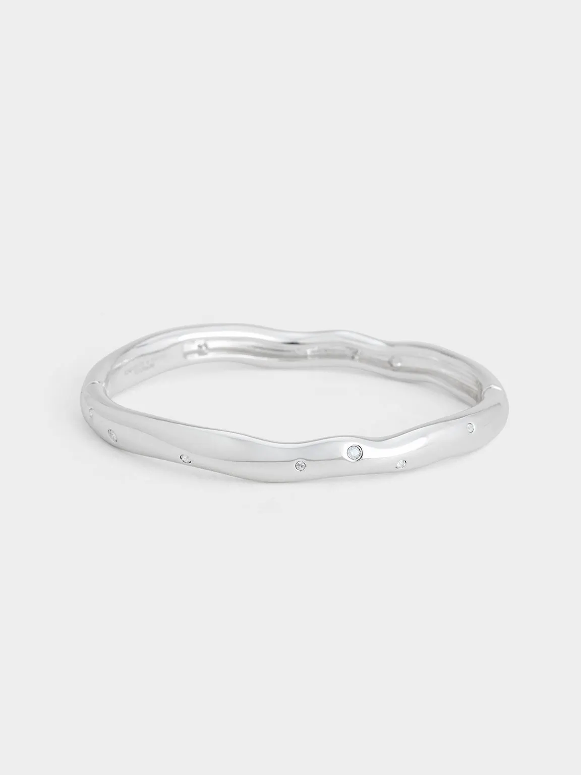 Charles & Keith - Ottilie Crystal Sculptural Bangle sold by Charles & Keith