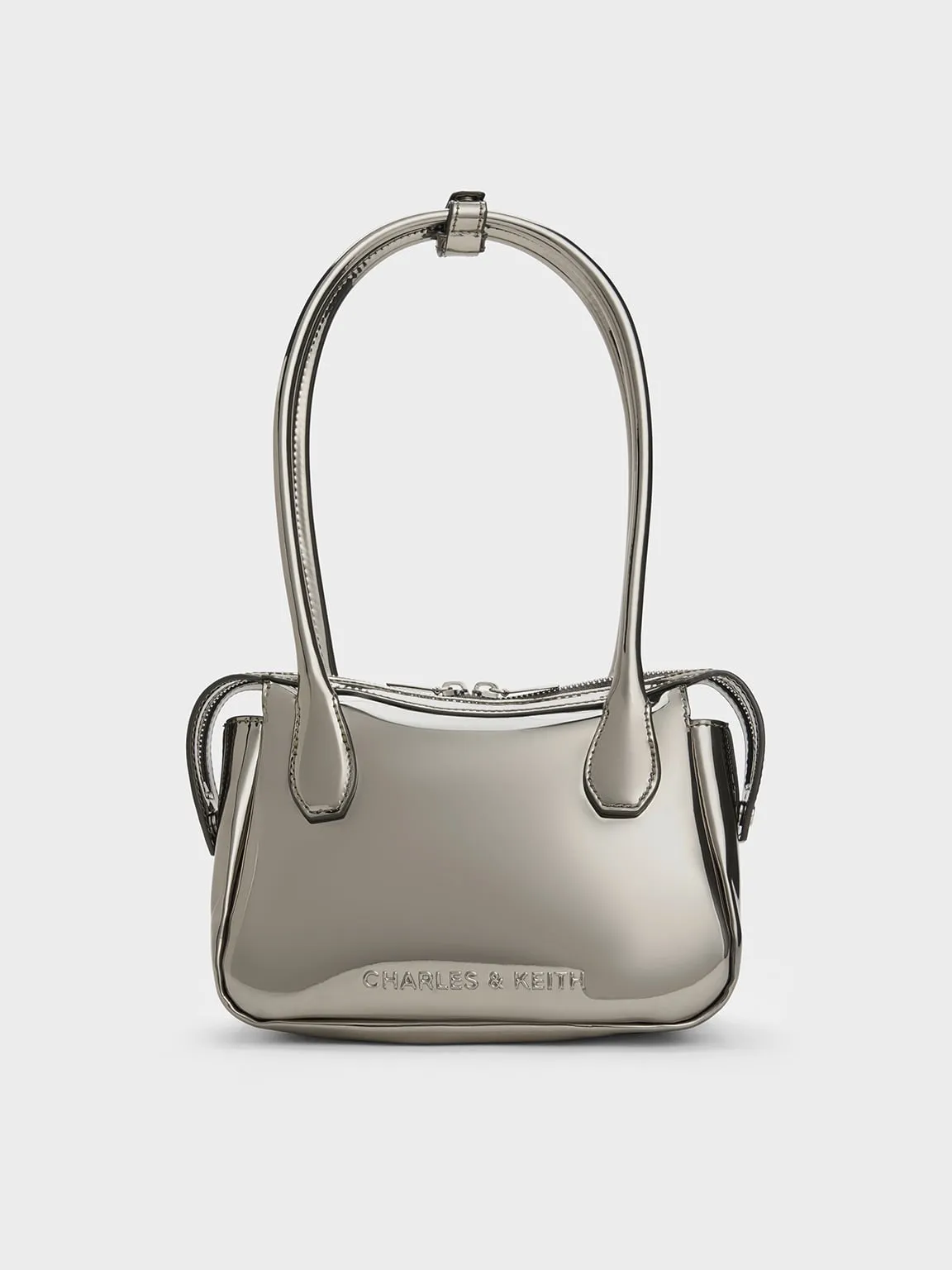 Charles & Keith - Bosie Metallic Elongated Top Handle Bag sold by Charles & Keith