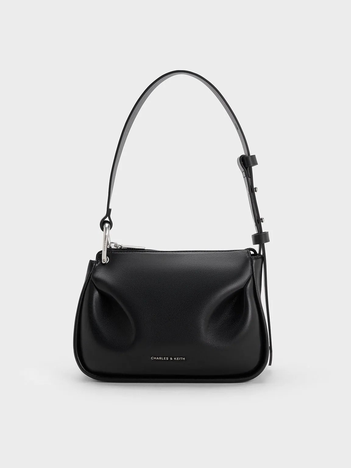 Charles & Keith - Lumen Padded Crossbody Bag sold by Charles & Keith