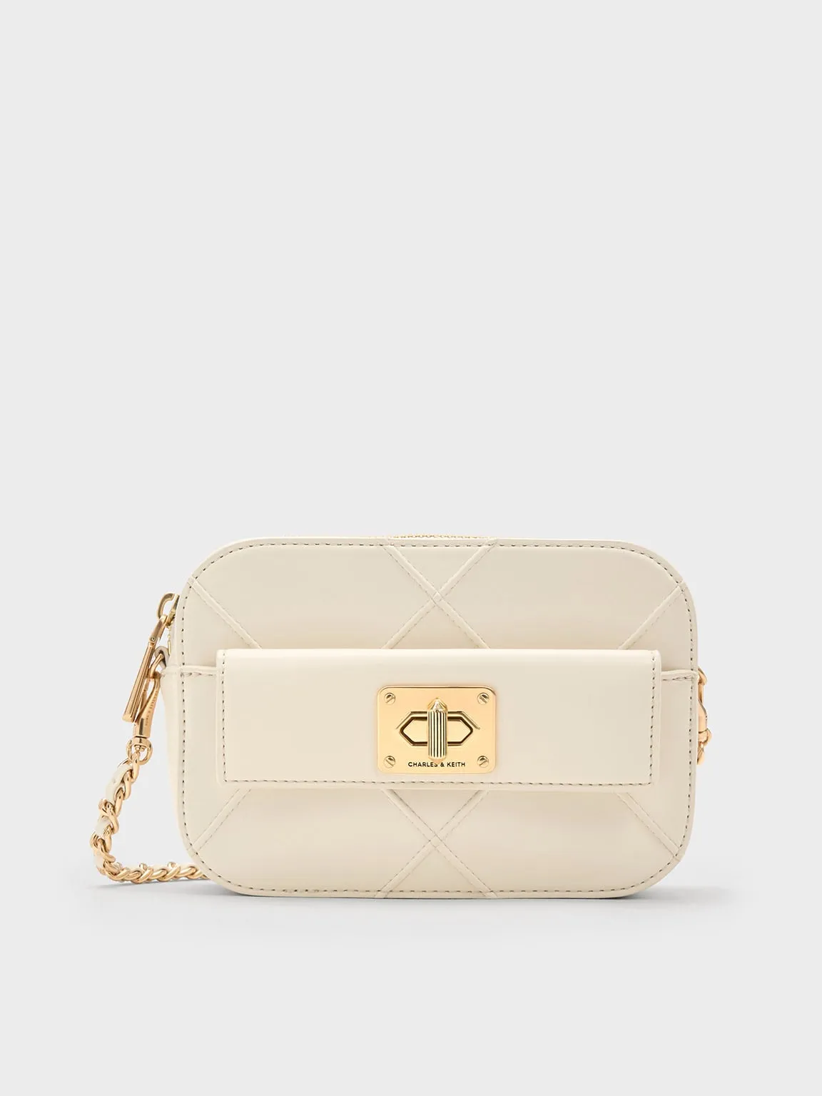 Charles & Keith - Eleni Quilted Zip Crossbody Bag sold by Charles & Keith