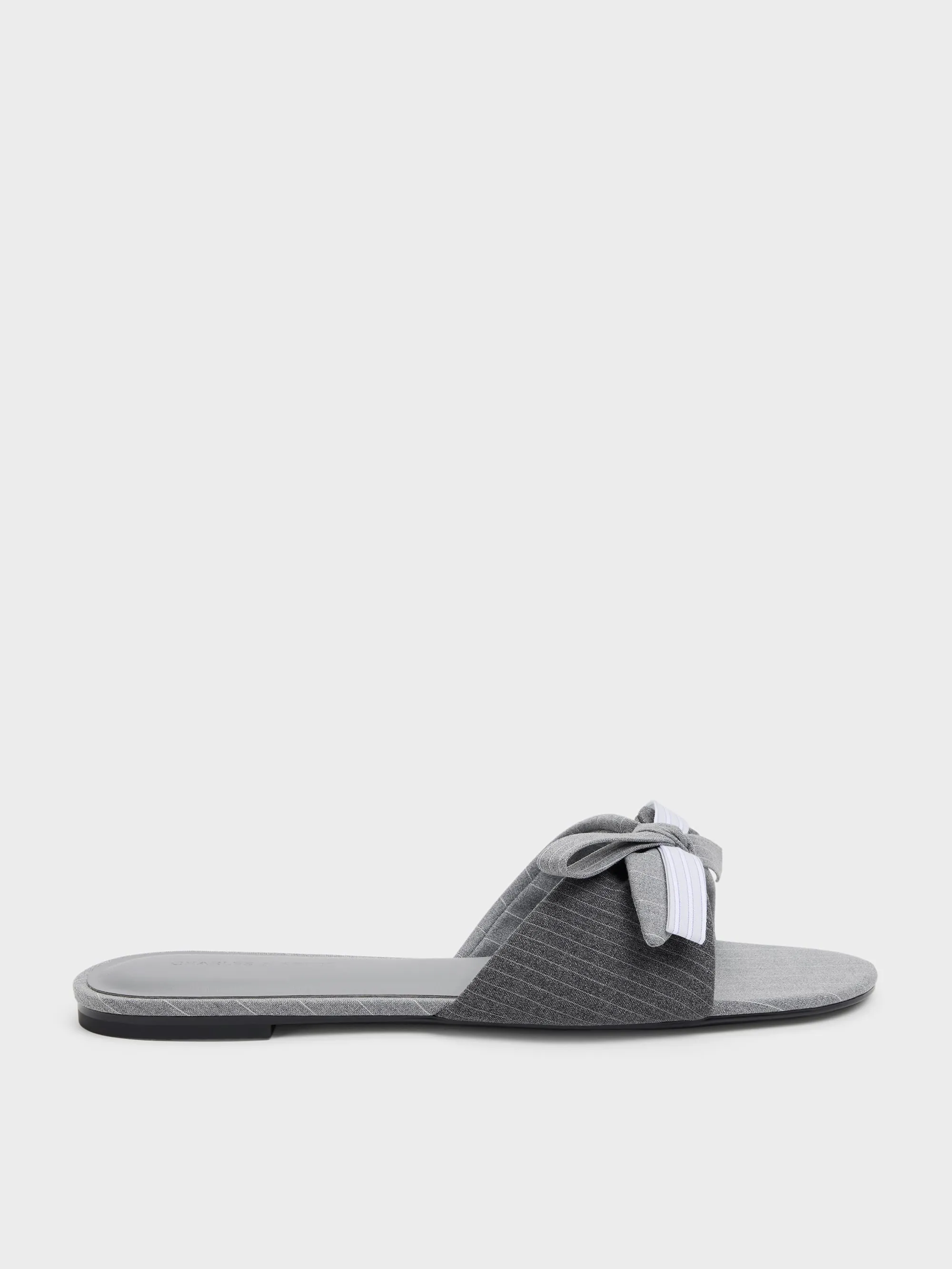 CHARLES & KEITH - Striped Bow Slide Sandals sold by Charles & Keith