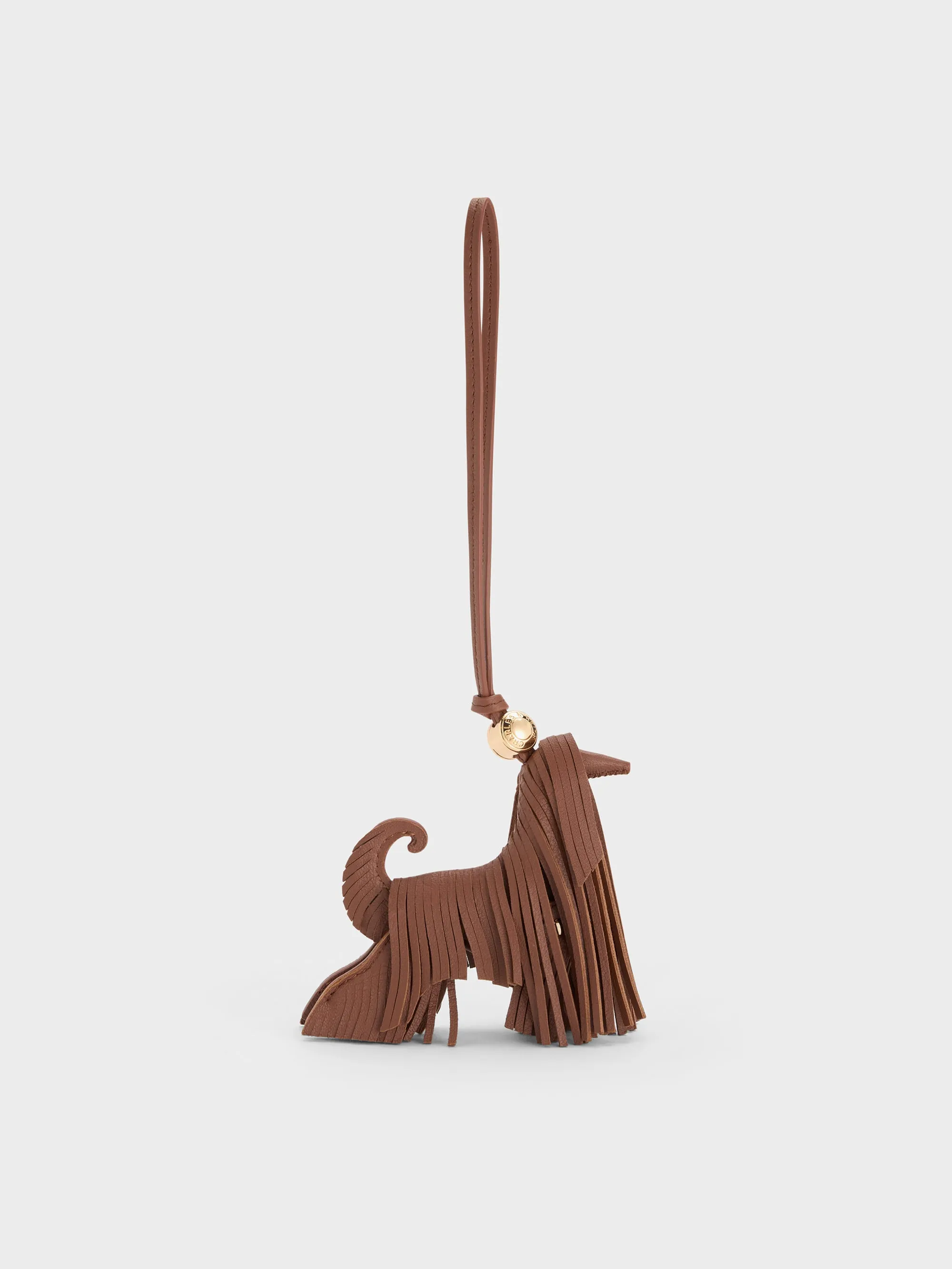 Charles & Keith - Leather Fringed Dog Charm sold by Charles & Keith