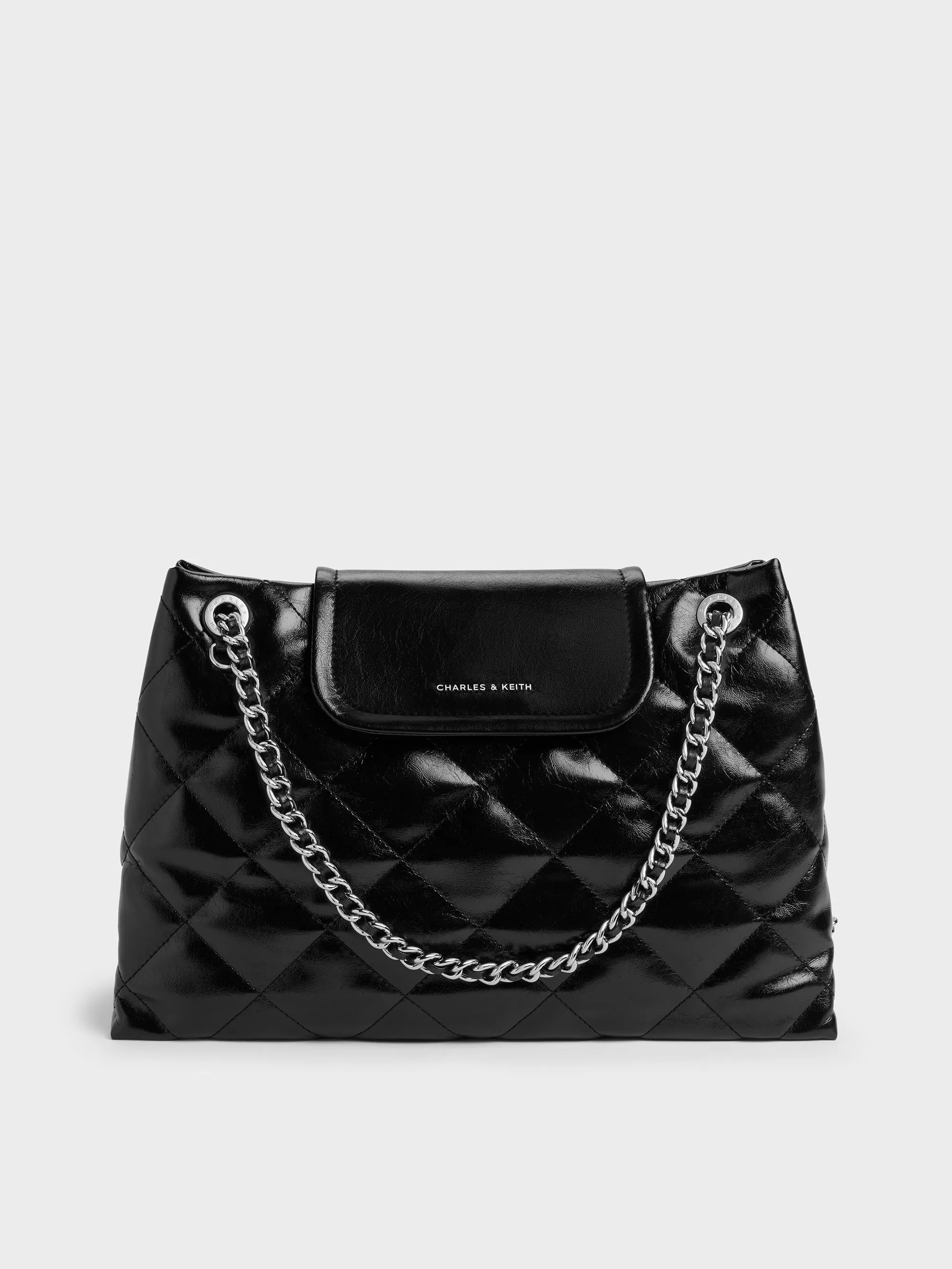 CHARLES & KEITH - Large Apfra Quilted Shoulder Bag sold by Charles & Keith