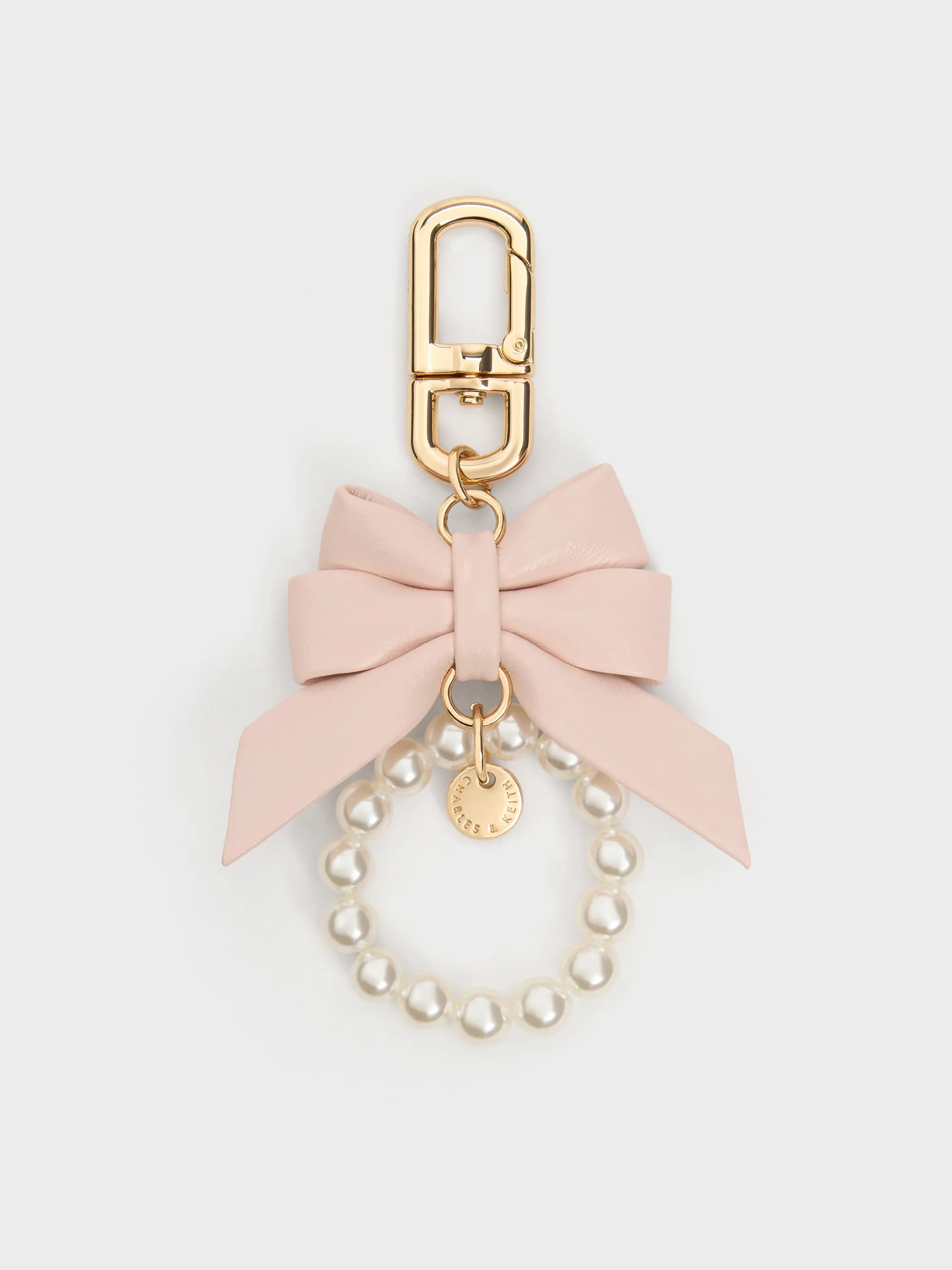 CHARLES & KEITH - Halsey Bow-Pearl Charm sold by Charles & Keith