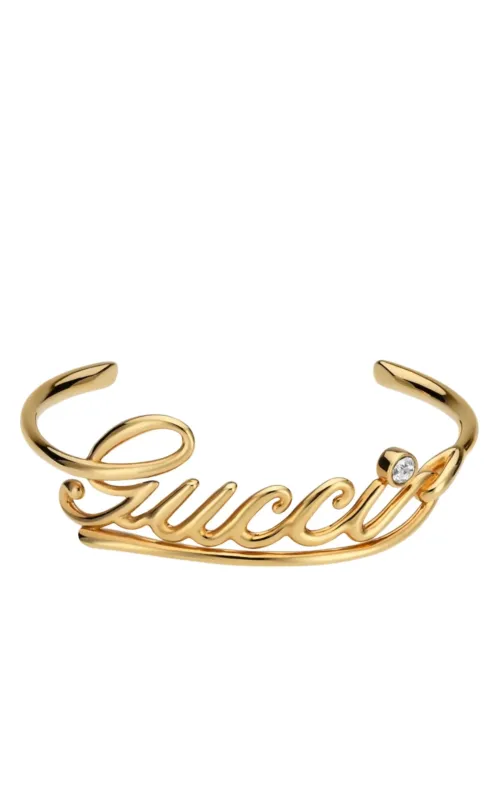 Gucci Cuff Bracelet with Logo Script sold by Runaway Catalog