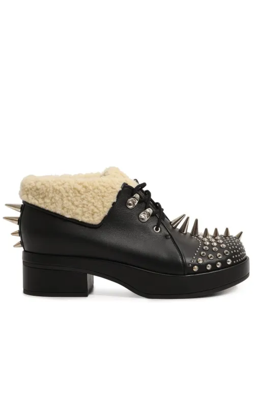 Studded Ankle Boots sold by Runaway Catalog