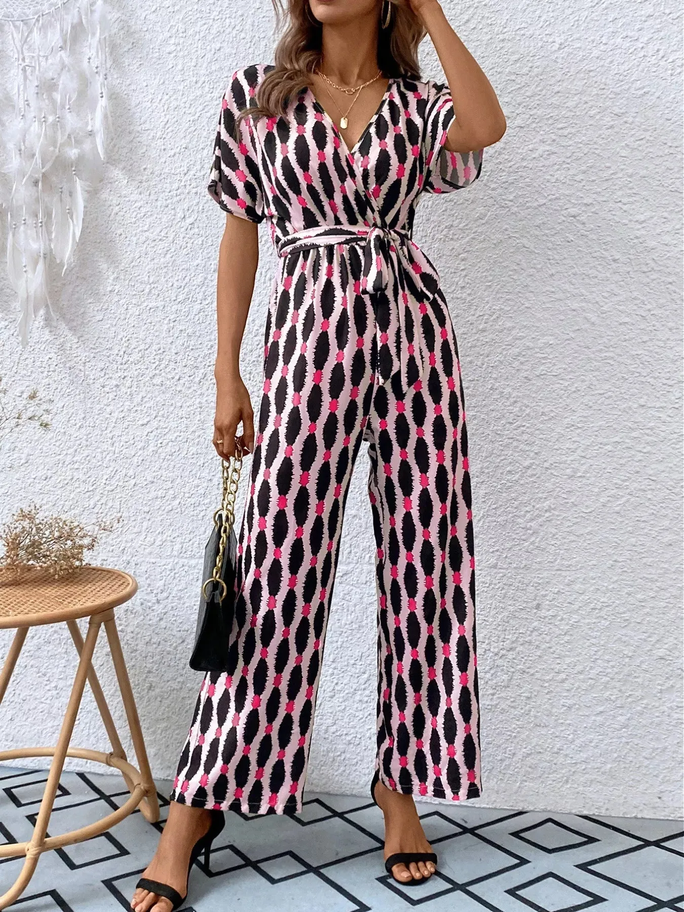 Printed Surplice Tie Waist Short Sleeve Jumpsuit sold by Unique Kulture product image thumbnail 2