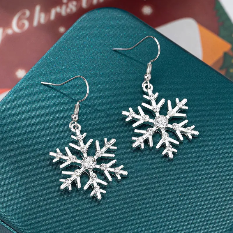 Christmas Snowflake Dangle Earrings sold by Unique Kulture