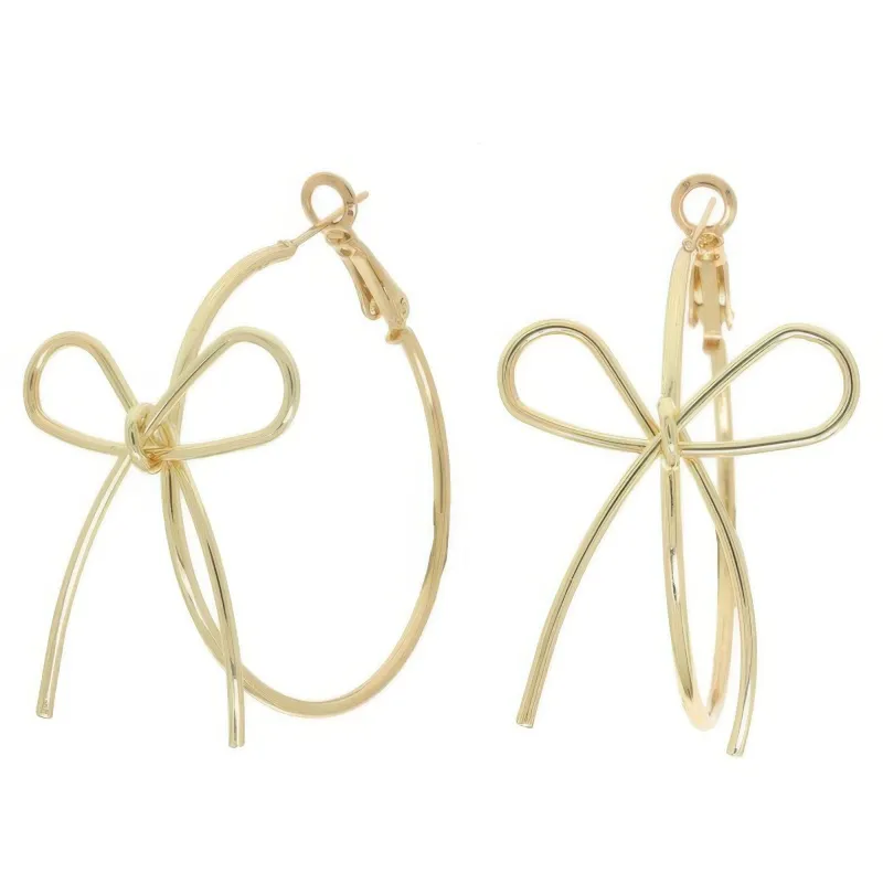 Polish Open Bow Wire Hoop Earrings sold by Unique Kulture